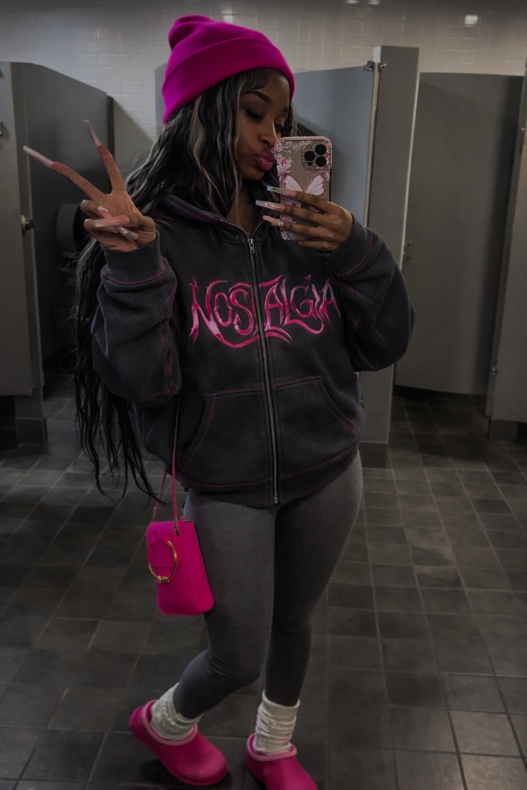 ‘wolf grey’ hoodie w/ pink stitching.