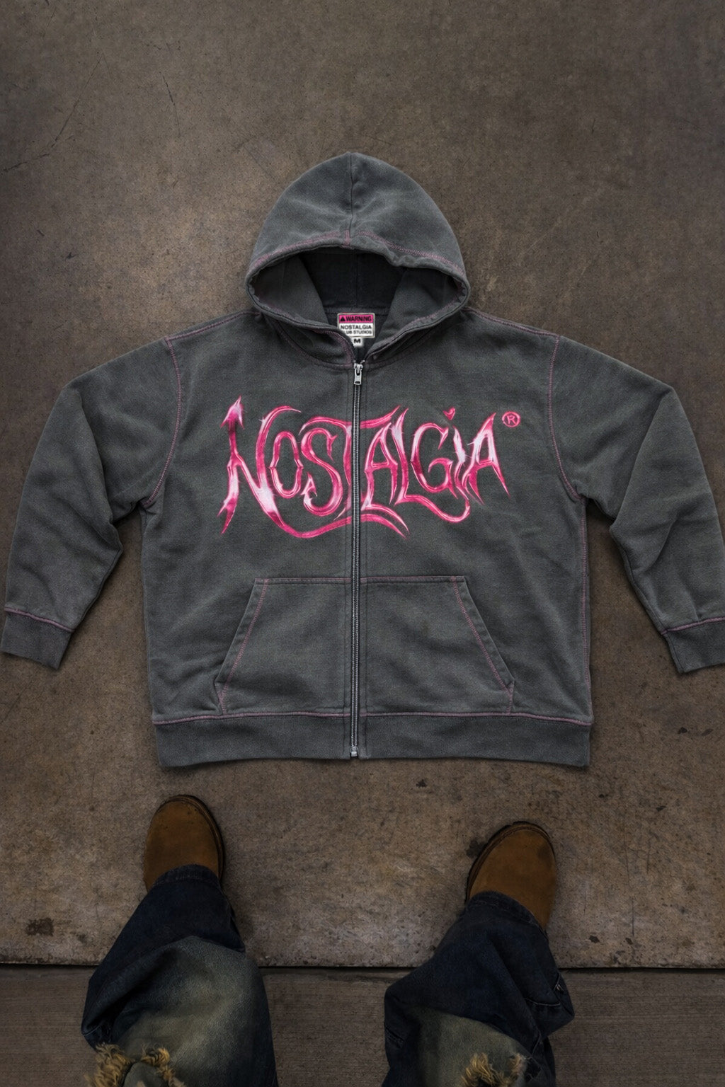 ‘wolf grey’ hoodie w/ pink stitching.